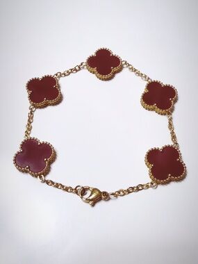 Gold-Tone Bracelet with Burgundy Clover Motifs
